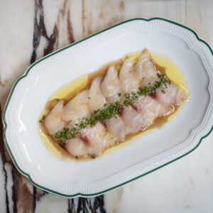 Lilibet’s London offers an exquisite selection of raw and cooked seafood dishes, including our fan-favourite Citrus-Infused Fish Crudo. Served on elegant porcelain against our signature marble backdrops, our dishes celebrate Mediterranean simplicity with a London flair. Join us at Lilibet's for an authentic seafood dining experience that prioritises quality and flavour.